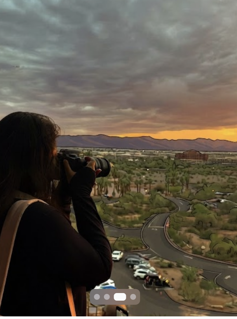 Shreya photographing the sunset over the desert
